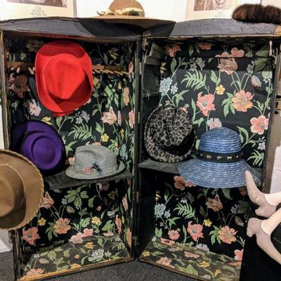 Antique black trunk and fabulous hats