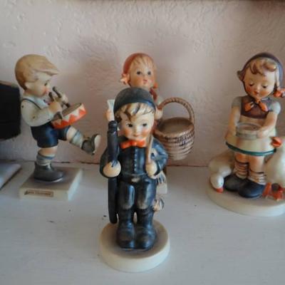 4 Hummel figurines