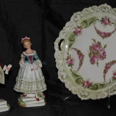 Lefton Vintage Porcelain Bisque Hand Painted Colonial Couple. Figurines shown with Moritz Zoekauer Hallmark  (1884-1902 ) 12" Plate