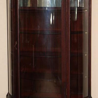 Antique Mahogany Bow Front China Cabinet with 4 Adjustable Shelves raised on Claw Feet with Original Casters