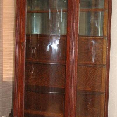 Antique Oak Serpentine Glass Front China 5-Shelf Cabinet raised on Claw Feet & Original Casters