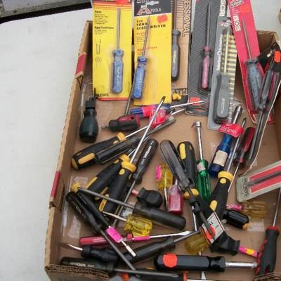 large lot of screw drivers