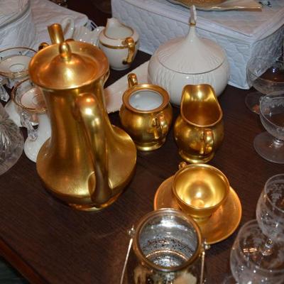 Gold teapot with creamer and sugar dish