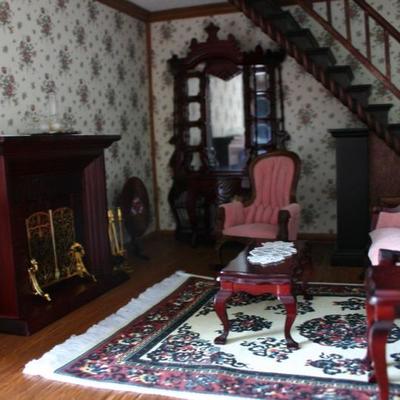 Miniature Furnished Living Room with Fireplace  
http://www.ctonlineauctions.com/detail.asp?id=682954