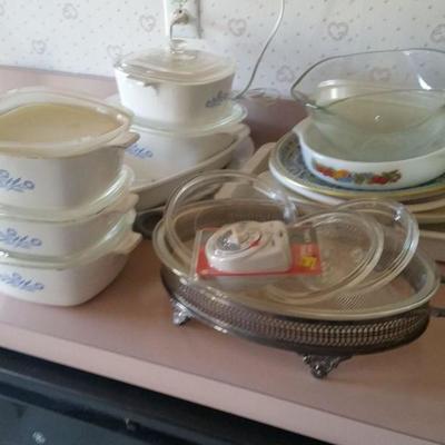 lots o f pyrex, corning ware cornflower, extra lids & carriers, other bakeware