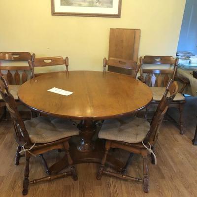 Dining table has two leaves and 6 chairs asking $150