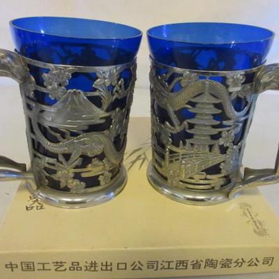 Unique and in blue with silver cup holders, two expresso cups