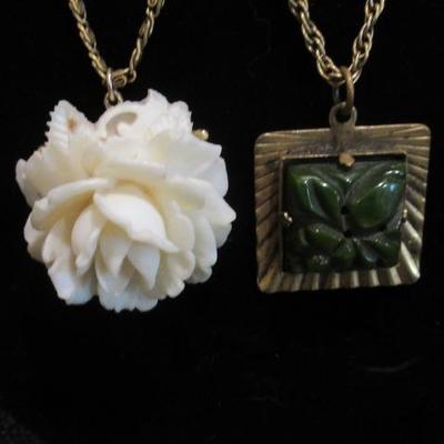 Faux jade and ivory pendants