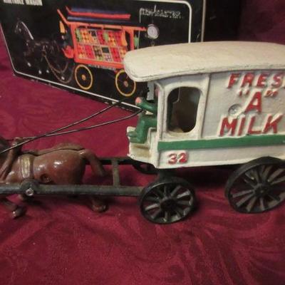 Heavy die cast vintage horse and milk buggy