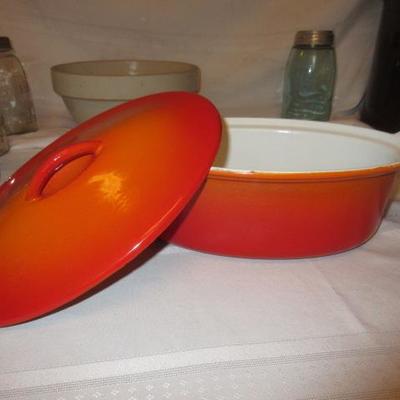 Le Creuset cookware piece, a large roasting pan with lid, cast iron vintage.