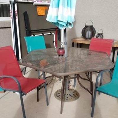 Patio Table + Chairs and Umbrella