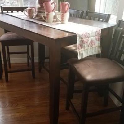 Tall Table with 6 chairs and 2 additional leaves