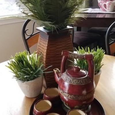 Ceramic Teapot, cups and Decorative Greens
