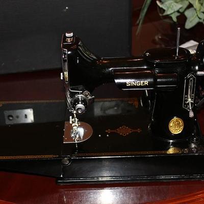 Antique portable Singer sewing machine
