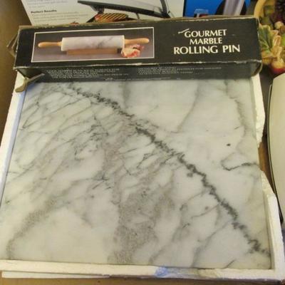 Unused marble cutting block and rolling pin