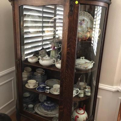 Curious cabinet filled with china pieces 