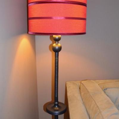 One of a pair of floor lamps