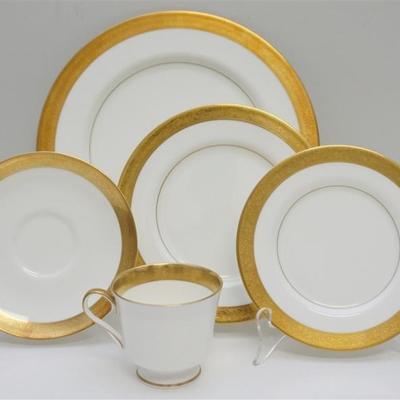 38 Piece Mikasa Harrow Bone China Dinnerware. All in excellent condition. White Bone China With gold encrusted rims. 8 Dinner Plates 10...