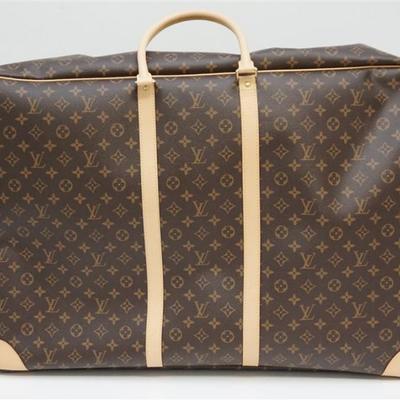Original Louis Vuitton Sirius 70 Suitcase. Perfect for travel, this is the largest of the Sirius suitcases closes with a double zipper....