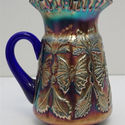 Hard to find Fenton 1918 Butterfly and Fern Blue Carnival Glass Water Pitcher. This pitcher is rated #2 in rarity as it is hard to find....