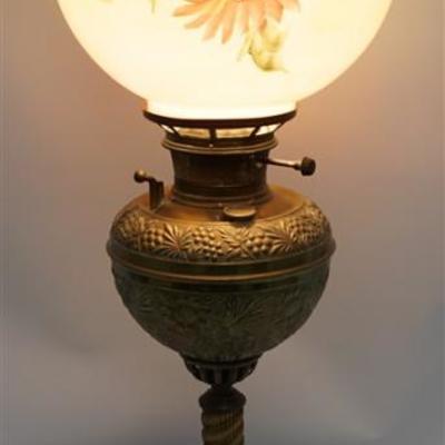 Bradley & Hubbard ornate Victorian banquet lamp with floral painted ball glass shade. Repousse floral ball and column with raised relief...