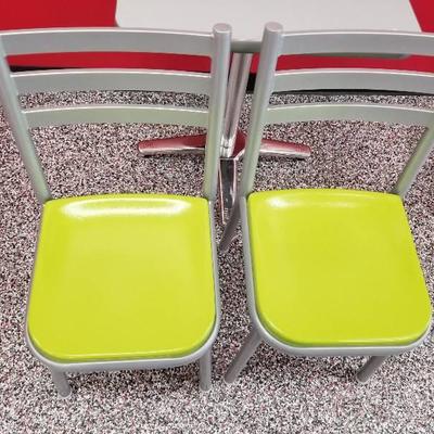 Lot (2) metal framed chairs with green seat