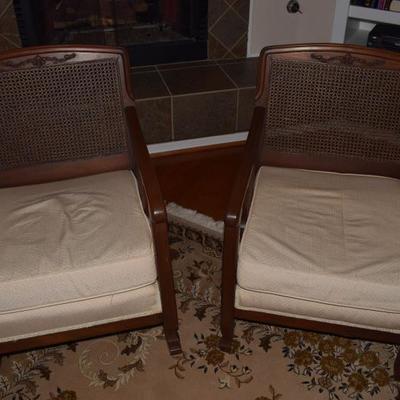 Cane backed rocker and chair with upholstered cushions. Excellent condition.
