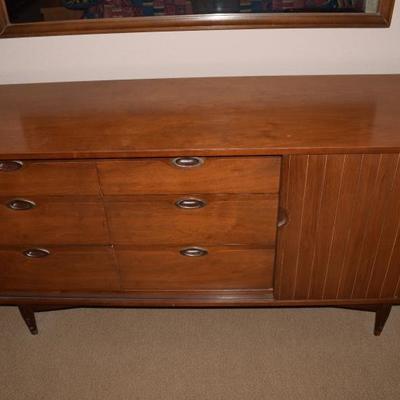 Mid-century dresser and mirror from Mainline by Hooker. Excellent condition.