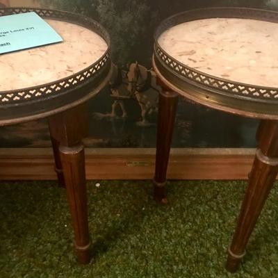 These beautiful marble topped matching side tables, are adorned with brass rimmed heart cut outs.

$120.00 each