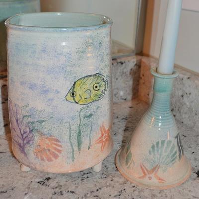 Art pottery footed vase and candleholder with fish motif