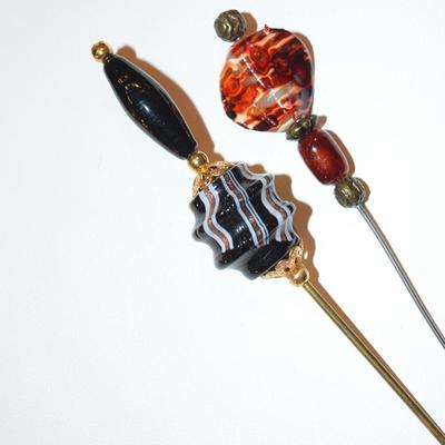 Pair of Venetian glass hat pins