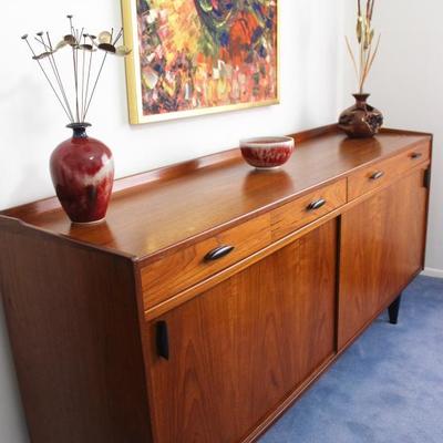 Beautiful solid-wood Swedish mid-century buffet, featuring dovetailed joints in excellent condition. Does not have any makers marks but...