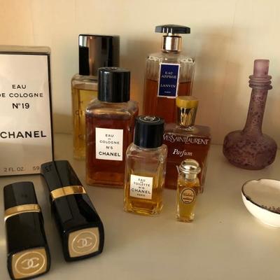 Selection of high-end vintage perfumes including unopened Chanel 