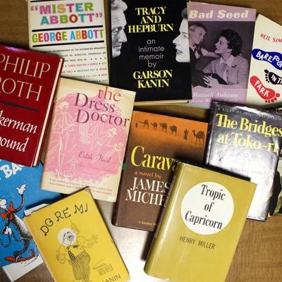 Hundreds of books, including first editions (sampling shown)