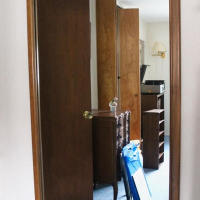 Wood-framed mirror, 55.5" high x 33.5" long