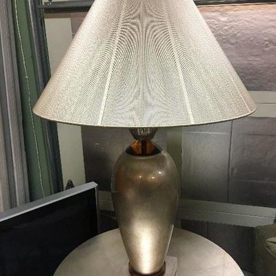 Metallic lamp with amber color Lucite accents and string shade, from the Merchandise Mart