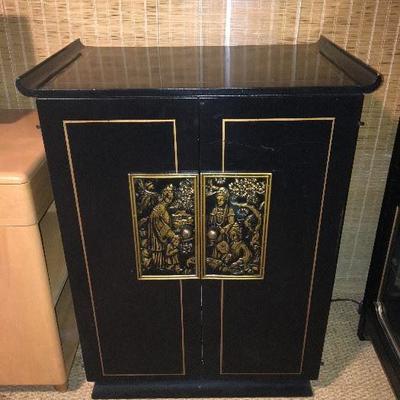 Mid-century Asian black lacquer TV cabinet with gold metallic accents