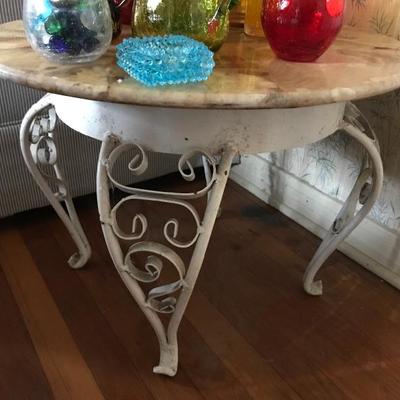 Round Marble Top Table w/Filagree Iron Bass
(23â€dia x 17â€h) $120