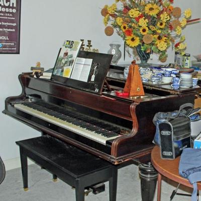 Baby grand piano from London