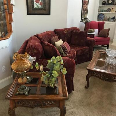 Curved Maroon Sofa, with glass top coffee and side tables