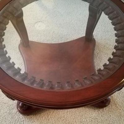 Glass Top reveals Detailed Leaves Edging within Table Top