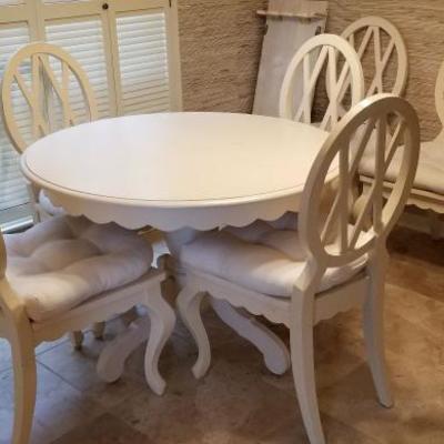 Solid wood white dining table with extra leaf and 6 chairs