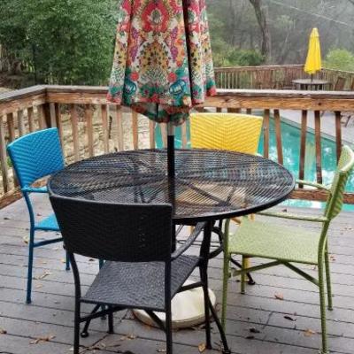 Metal patio table with umbrella and 4 chairs in assorted colors