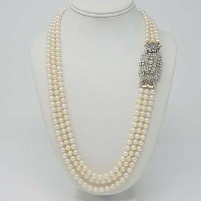 Triple Stand Akoya Pearls with Deco 18k Gold and Diamond Brooch / Clasp.

2010 Appraisal $4,950.00