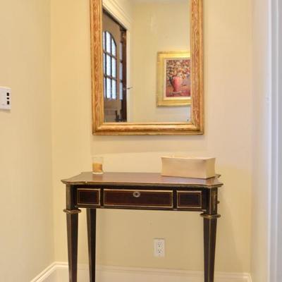 Painted table and antique mirror