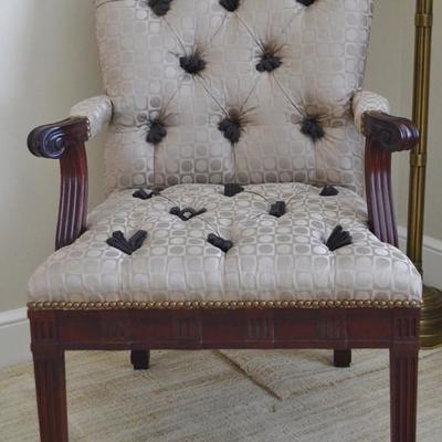 Cherry tone side chair with tufted gold upholstery