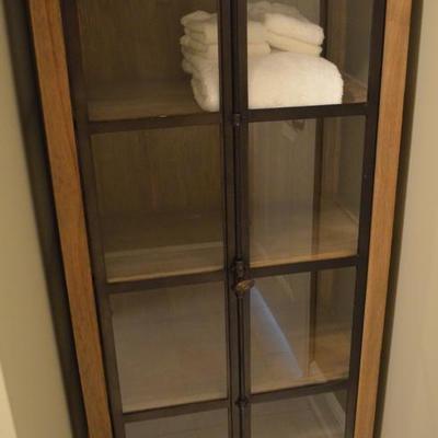 Pine curio cabinet with glass and iron doors