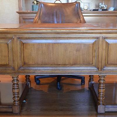 Lexington Furniture Executive desk with carved panels, turned legs and embossed leather top