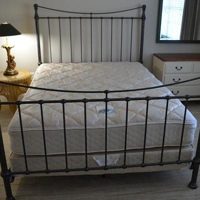Designer queen sized black iron bed
