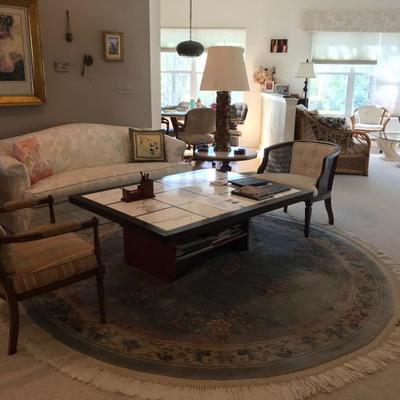 rugs, couch, side tables, mid century side chair, victorian side chair, marble & wood coffee table.